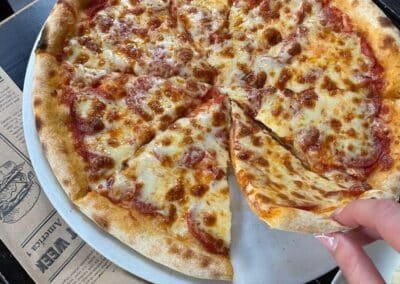 pizza with tomato sauce and cheese