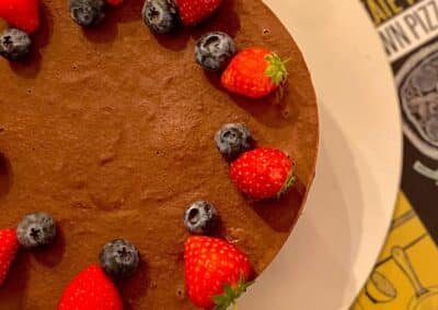 cake with strawberries and blueberries